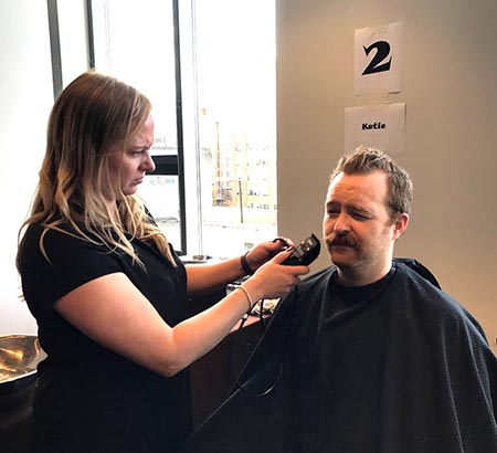 Employee is getting his beard shaved!