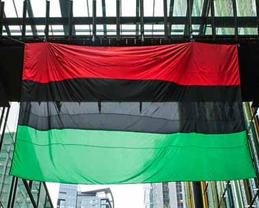 The Pan-African flag flies from a building on Amazon's Seattle campus.