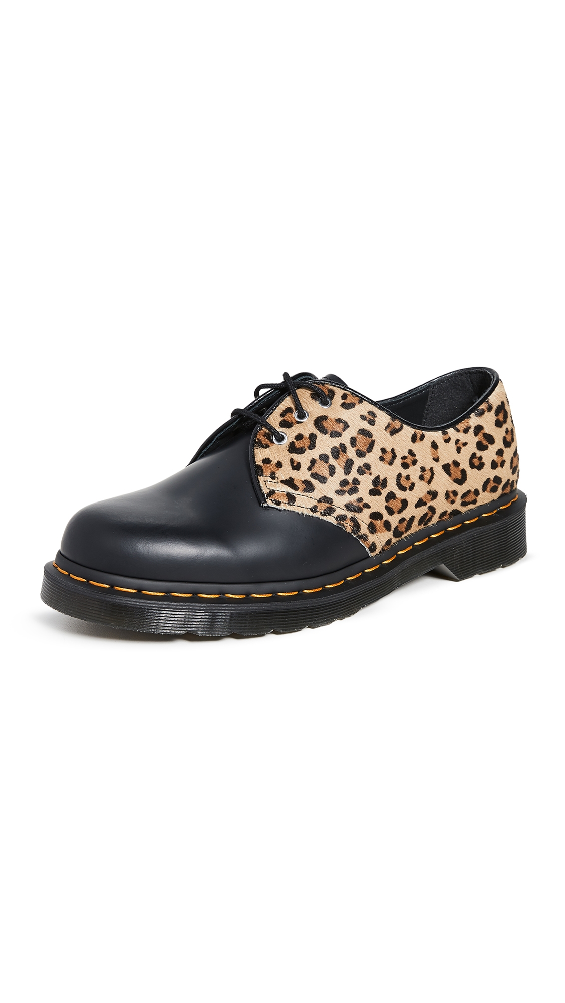 cow print dr martens