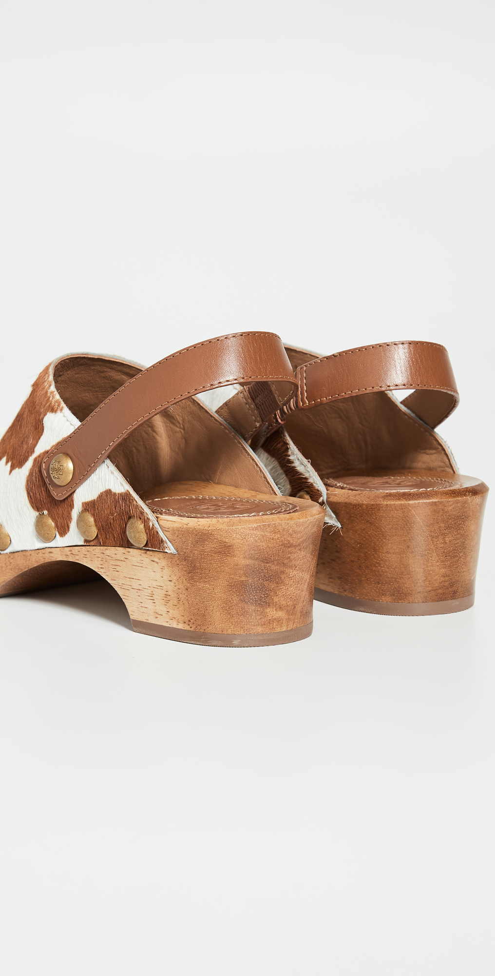 tory burch cow clogs