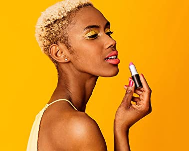 Woman applying makeup