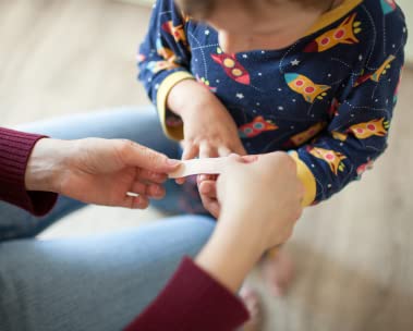 Child with bandaid