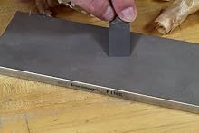 8-Inch Fine Dia-Sharp bench stone sharpening a chisel