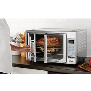 Oster TSSTTVFDDG Digital French Door Oven, Stainless Steel $123.71 at