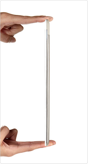 Kindle DX is just over 1/3 of an inch