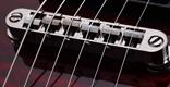 Detail of the TonePros TOM w/Thru Body Bridge.