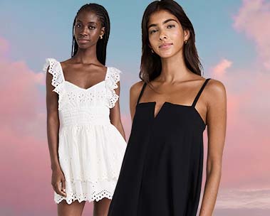 Girl up front in a blue dress and girl behind her in short white dress