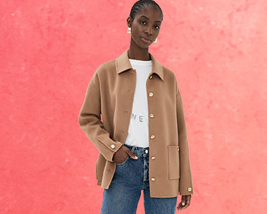 Girl in tan jacket and jeans