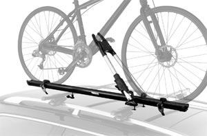 The Thule Big Mouth Upright Rooftop Bicycle Carrier mounted on a car rack