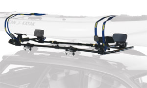 A sit-on-top ocean kayak loaded onto a Thule 887XT SlipStream XT Kayak Roof Rack Mount Carrier A sit-on-top ocean kayak loaded onto a Thule 887XT SlipStream XT Kayak Roof Rack Mount Carrier