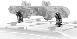 Thule 575 Snowboard Carrier Rooftop Rack holding two snowboards and mounted on a car roof rack