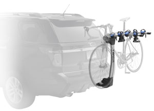 Thule 9025 Apex four-bike hitch mount carrier mounted on a car