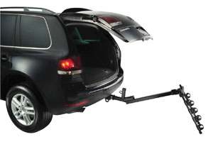An unloaded Parkway 4-Bike Hitch Mount Carrier Rack in the down position allowing access to a hackback