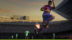 Ronaldinho taking taking the ball in the air in 'FIFA Soccer 09' for PC