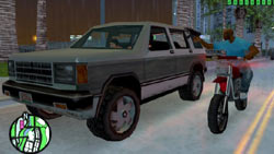 Targeting an SUV from a motorcycle in 'Grand Theft Auto: Vice City Stories'