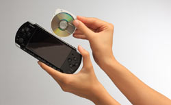 UMD disc being inserted into a Piano Black PSP-3000