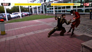 Costumed fighters battling against the backdrop of a real business park in Reality Fighters