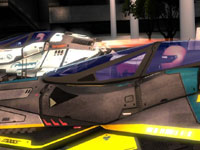 Two antigravity racing vehicles side-by-side on a race track in WipEout 2048