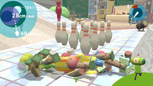 An elongated katamari about to be rolled into bowling pins in Touch My Katamari