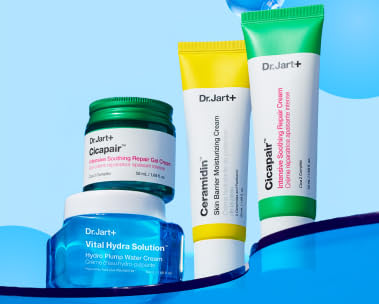 Dr. Jart+ Korean skincare products featuring an skin barrier moisturizing cream in a small container on top of a vital hydra solution cream containernext to a skin barrier moisturizing cream tube and an intensive soothing repair cream tube.