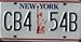 New York Statue of Liberty License Plate blue numbers with red statue emblem