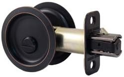 Round Pocket Door Lock, Privacy (Bed/Bath) Latch, 2-3/8" Backset, RCL, Vintage Bronze by Stone Harbor Hardware