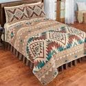 Southwest-inspired quilt with coordinating Aztec pattern on one side and a reverse pattern on the other, priced at $30.98 as of August 9, 2023.