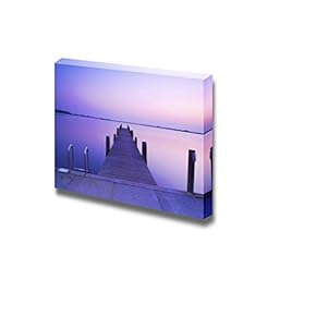 A Beautiful Blue Sunset with a Jetty Over a Lake with an Evening Glow - Canvas Art Wall Art - 12" x 18"