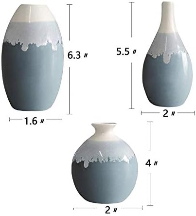 Blue ceramic vase on a white background, priced at $32.99 as of August 9, 2023.