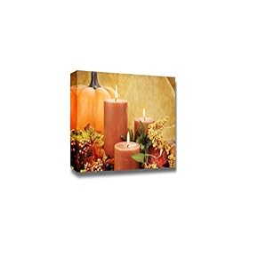 Lit Candles Surrounded by Autumn Wall Decor