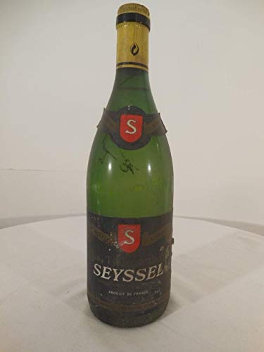 seyssel la Taconnière (millésime à peine lisible) blanc 1996 - savoie france: une bouteille de vin.