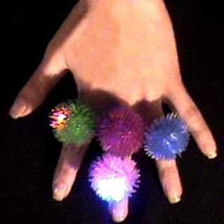 12 Soft Pom Pom LED Flashing Rings Assorted Colors