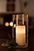 Enchanted Spaces Set of 12 Ivory 3x6 Wax Remote Controlled Battery Operated Flickering Candles with Remote and Batteries (Ivory, 12pk)