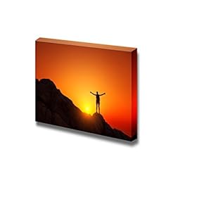 Young Tourist with Backpack Standing on a Rock and Enjoying Sunset - Canvas Art Wall Art - 12" x 18"