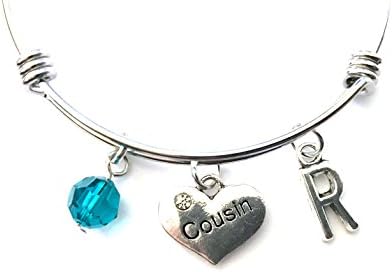 Cousin themed personalized bangle bracelet. Antique silver charms and a genuine Swarovski birthstone colored element.