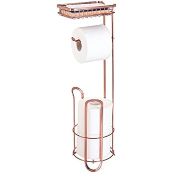 mDesign Freestanding Metal Wire Toilet Paper Roll Holder Stand and Dispenser with Storage Shelf for Cell, Mobile Phone - Bathroom Storage Organization - Holds 3 Mega Rolls - Rose Gold
