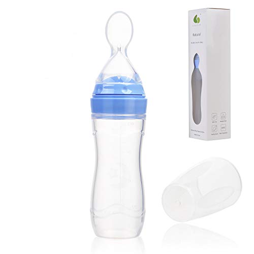 spoon feeding rice cereal at 2 months