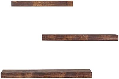 Floating shelves w invisible, blind hangers by THE FALLING TREE. (set of 3) 16''Wx2"Hx5.5D / 20"Wx2"Hx5.5D and 24"Wx2"Hx5.5"D in Dark Walnut stained pine.
