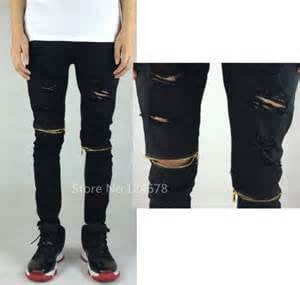 kanye distressed jeans