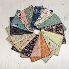 Lewis and Irene Chieveley layer cake 42 x 10 inch squares coordinating cotton quilting fabric with subtle metallic higlights in copper and gold