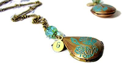 Teardrop Locket necklace in copper featuring blue florals and personalized with custom initial
