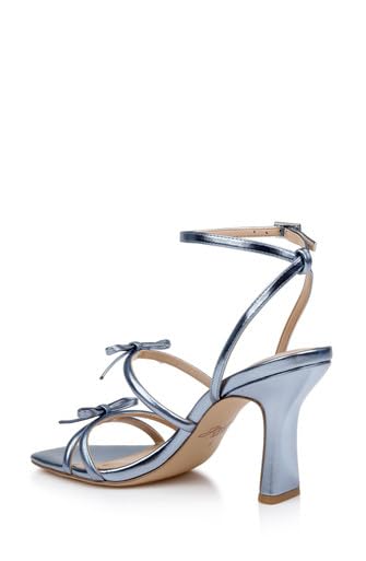 JEWEL BADGLEY MISCHKA KIYOMI II METALLIC DELICATE SANDAL WITH BOW STRAPS