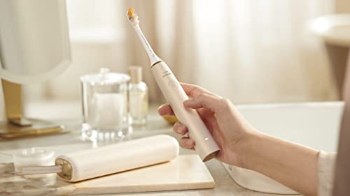 Philips Sonicare DiamondClean 9900 Prestige Electric Toothbrush - with SenseIQ Technology and Advanced AI App, 5 Brushing Modes, 3 Intensity Levels, Charging Travel Case, Champagne, HX9990/11