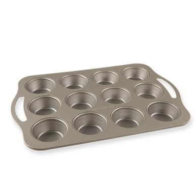 Photo 1 of (DENT)Nordic Ware Treat Nonstick 12 Cavity Muffin Pan, Silver