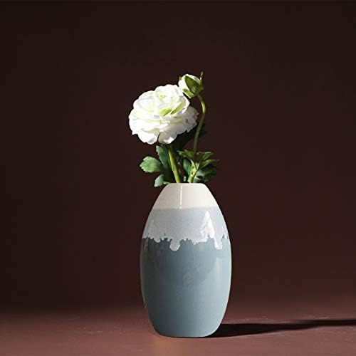 Blue ceramic vase, about 8 inches tall, priced at $32.99 as of August 9, 2023.