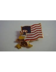 From Amazon.com. Click for details:
 Sports: 1984 Los Angeles Olympic Pin w/Sam Carrying USA Flag, Gold Plated Sports: 1984 Los Angeles Olympic Pin w/Sam Carrying USA Flag, Gold Plated