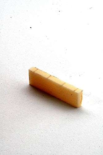 Musikalia Saddle - Fixed Nut for Brazilian Cavaquinho or Ukulele soprano or similar, 4 strings, celluloid/galakerite, cream-color. Width 37 mm, thickness 4 mm, height 10 mm