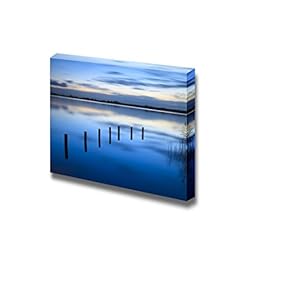 Calm Sunrise Over a Lake with Clouds Reflection in The Water - Canvas Art Wall Art - 12" x 18"