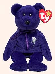 purple ty bear with white rose