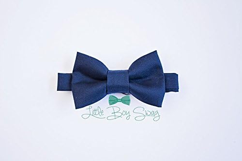 Boys navy bow tie. A stylish look for weddings, ring bearers, groomsman, birthday parties, cake smash or family photos.